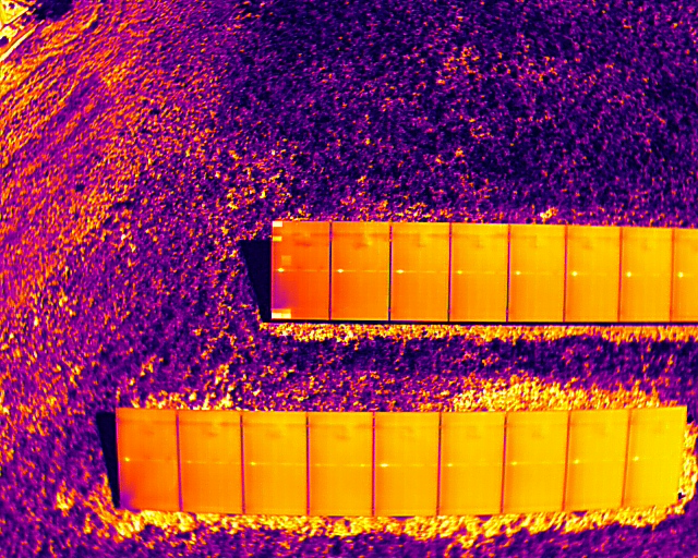 This image shows an infrared reading of a solar panel array